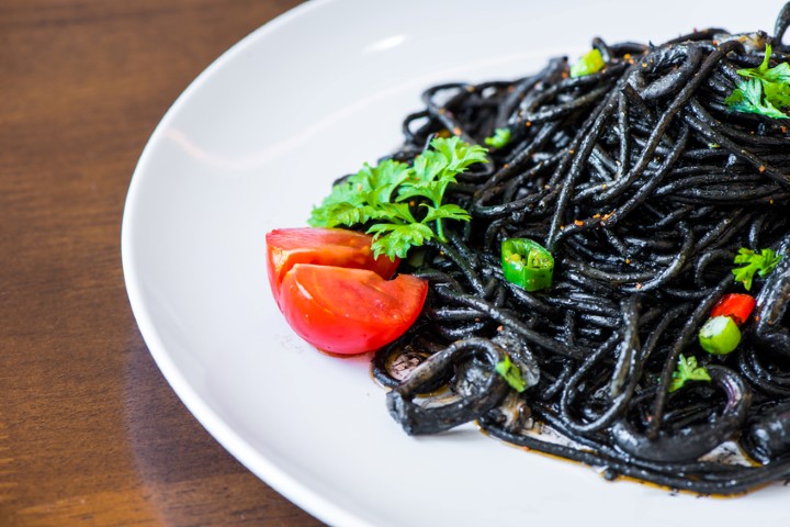 Pasta with Squid ink and seafood. Photo Courtesy @ superjoseph