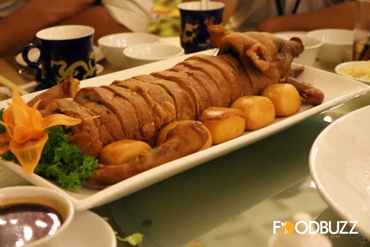 ជ្រូកខ្វៃរុំជាមួយបាយដំណើប