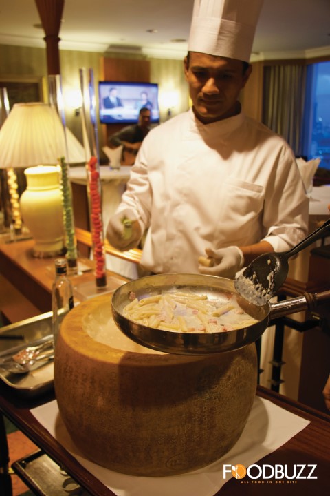 Flambe Parmigiano Cheese Wheel with Pasta Al Funghi