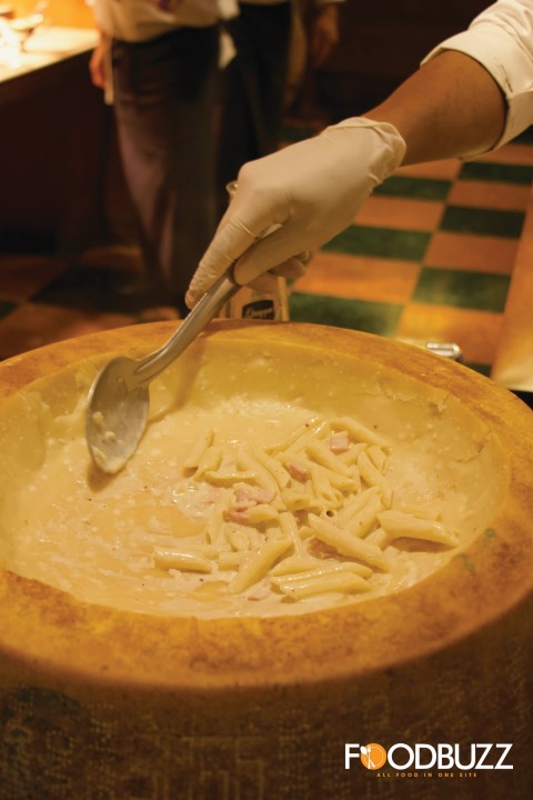 Flambe Parmigiano Cheese Wheel with Pasta Al Funghi